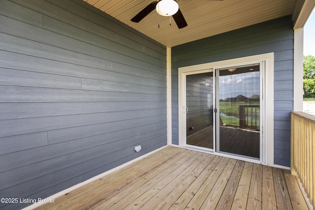 wooden deck with ceiling fan