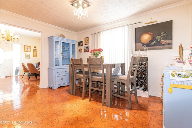 dining area featuring a textured ceiling, crown molding, a chandelier, and light tile patterned floors