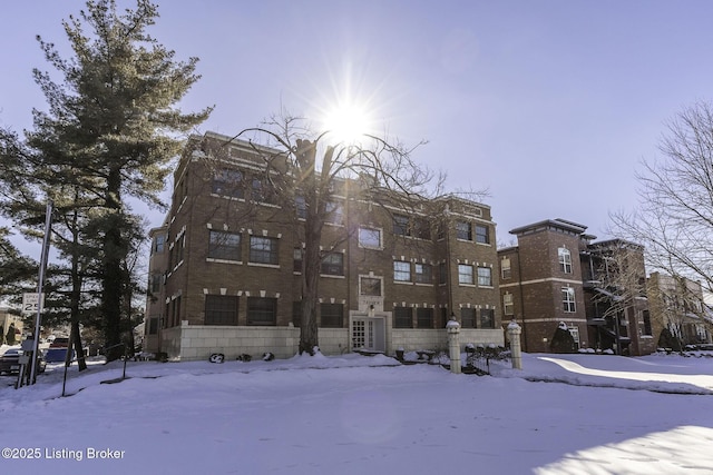 view of snow covered property