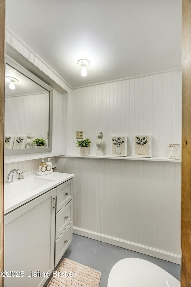 bathroom with finished concrete flooring and vanity