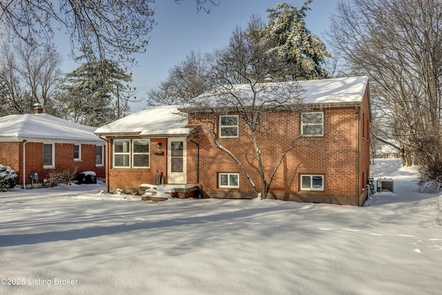 view of snow covered property