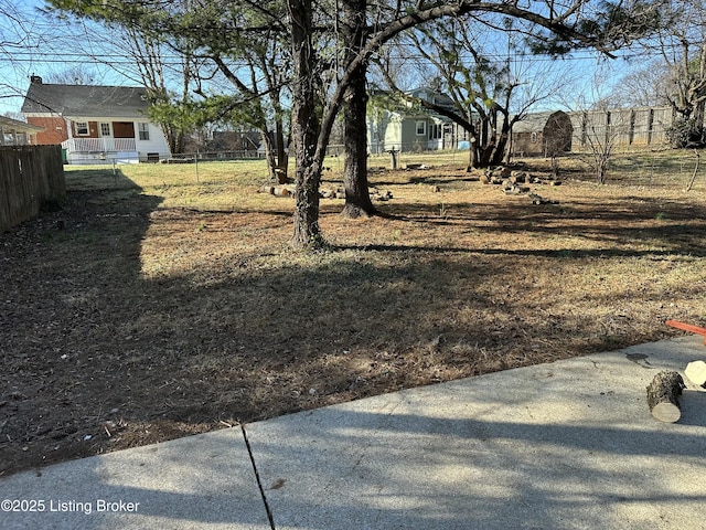 view of yard featuring fence