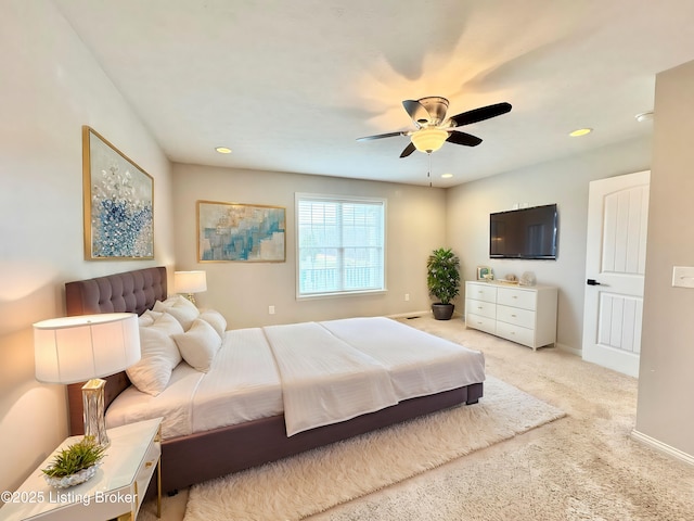 carpeted bedroom with ceiling fan