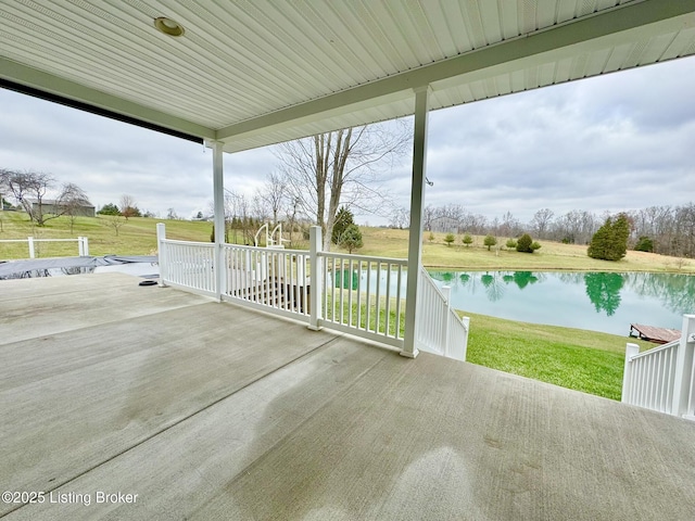 view of patio / terrace with a water view