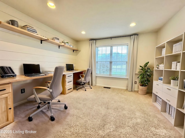 home office with light carpet