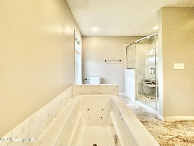 bathroom with separate shower and tub and toilet