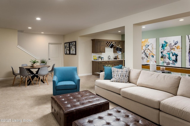 living room featuring light colored carpet