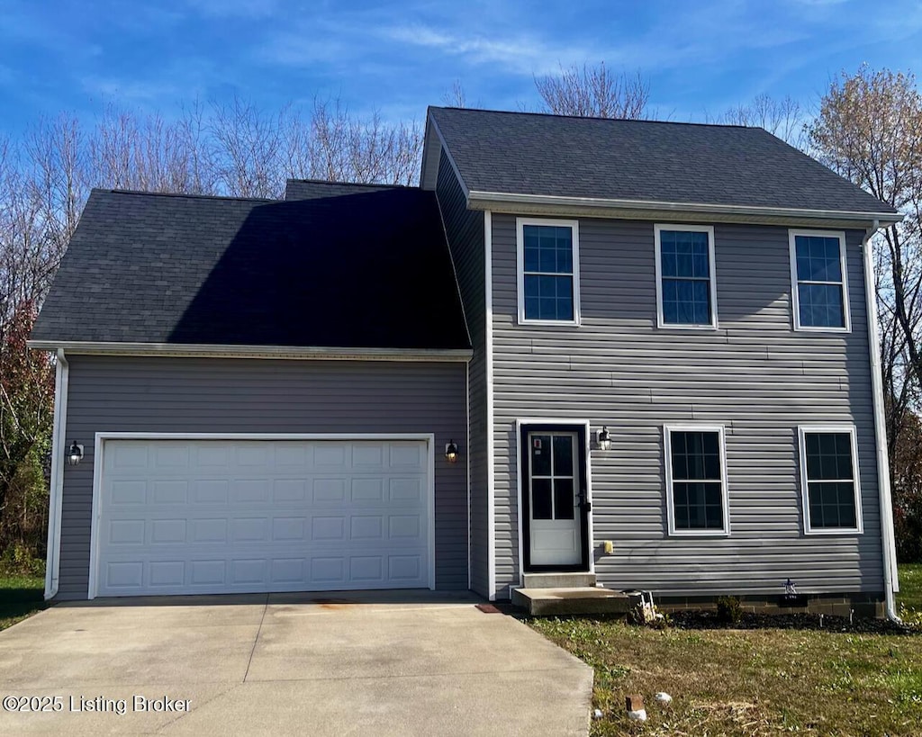 colonial home featuring a garage