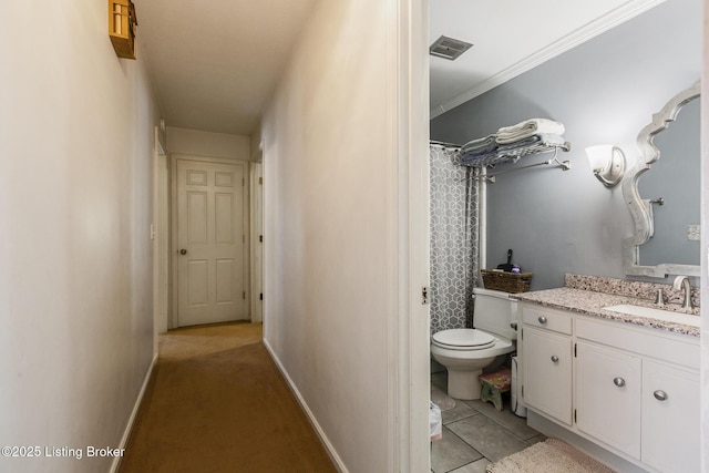 bathroom featuring ornamental molding, a shower with curtain, toilet, tile patterned floors, and vanity