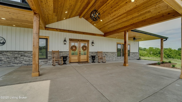 view of patio featuring french doors and ceiling fan