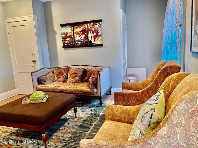 living area with wood-type flooring