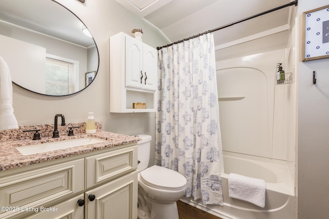 full bathroom with vanity, shower / bathtub combination with curtain, and toilet