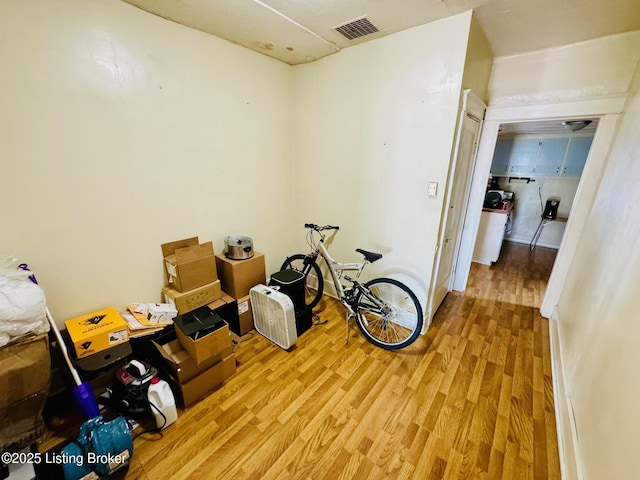 miscellaneous room with light hardwood / wood-style flooring