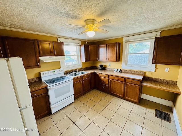 kitchen with white appliances, ceiling fan, crown molding, sink, and light tile patterned floors