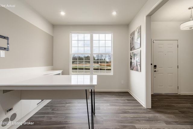 entrance foyer with dark hardwood / wood-style flooring