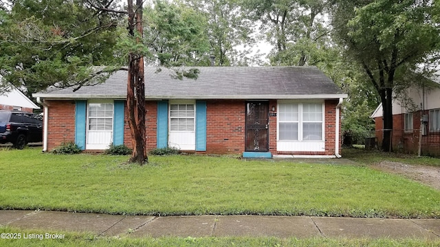 single story home with a front yard