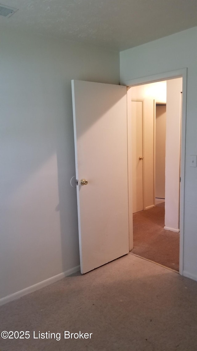 empty room with a baseboard heating unit