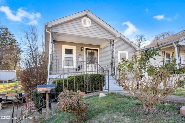 bungalow featuring covered porch