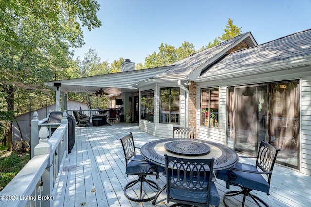 wooden deck with ceiling fan