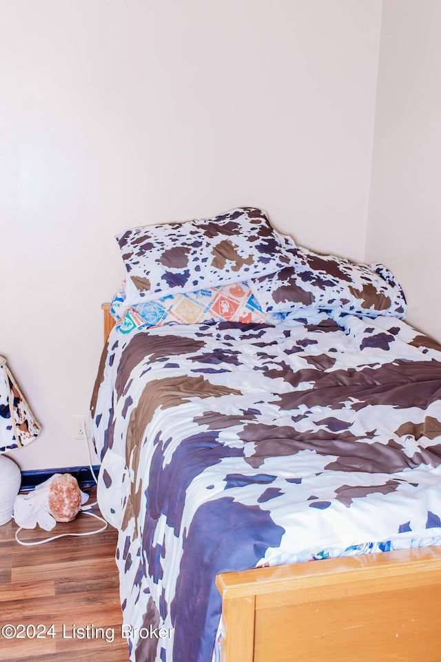 bedroom featuring wood-type flooring