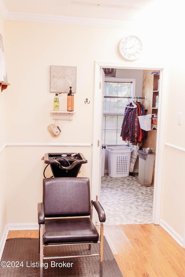 bathroom featuring hardwood / wood-style floors and ornamental molding