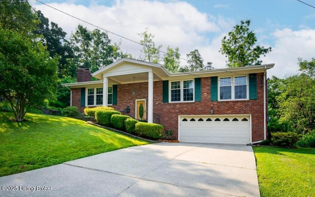 view of front of home with a front lawn and a garage