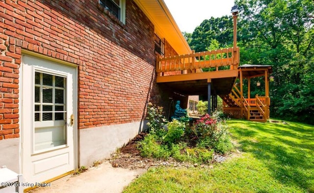 view of property exterior with a lawn and a deck