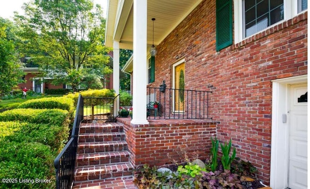 property entrance featuring covered porch