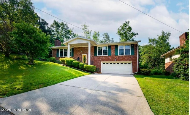 view of front of house featuring a garage and a front yard