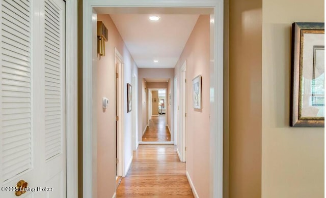 corridor featuring light hardwood / wood-style flooring