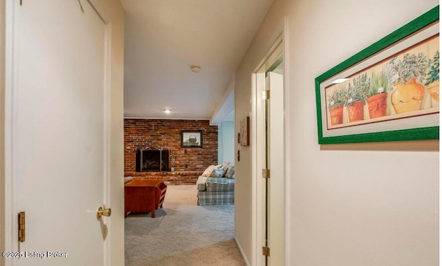 hallway featuring light carpet