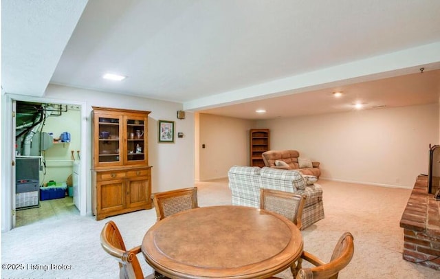 view of carpeted dining area