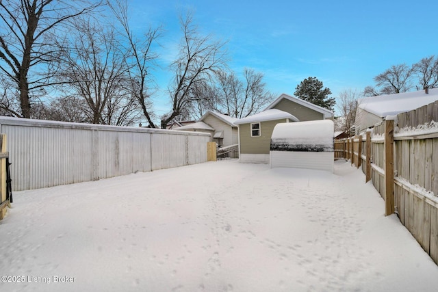 view of yard covered in snow