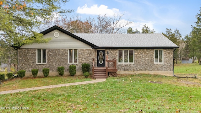 single story home with a front yard