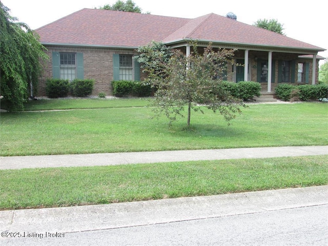 view of front of property with a front lawn