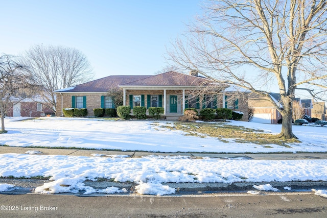 ranch-style house featuring covered porch