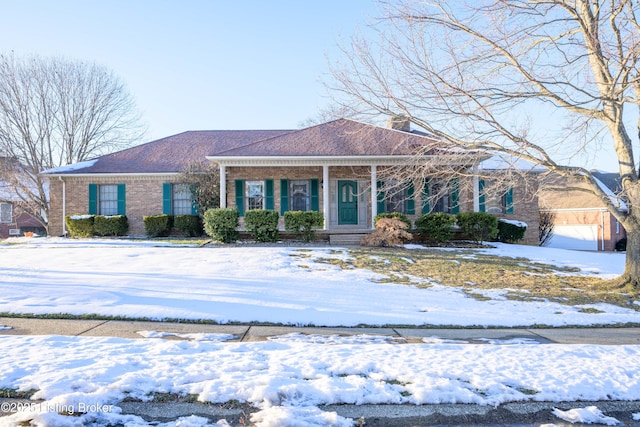 ranch-style home featuring covered porch