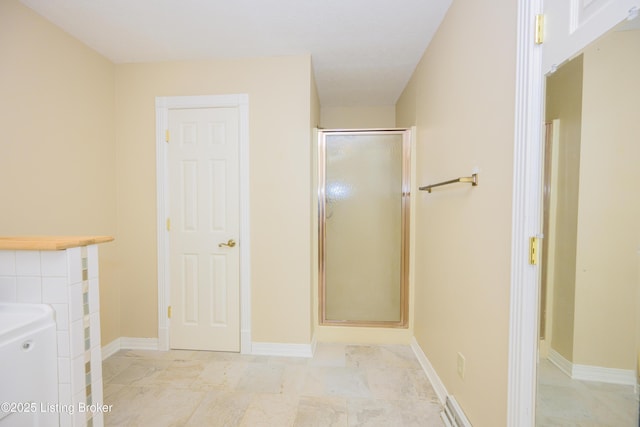 bathroom with tile patterned floors and shower with separate bathtub