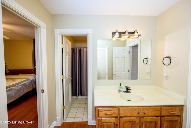 bathroom featuring vanity and tile patterned flooring