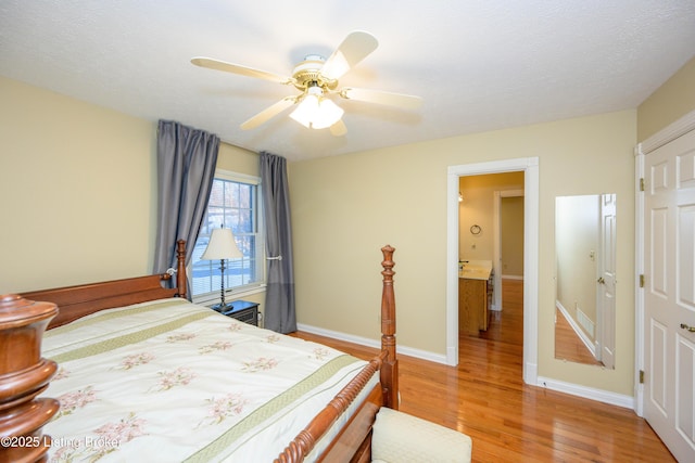 bedroom featuring ceiling fan and hardwood / wood-style flooring