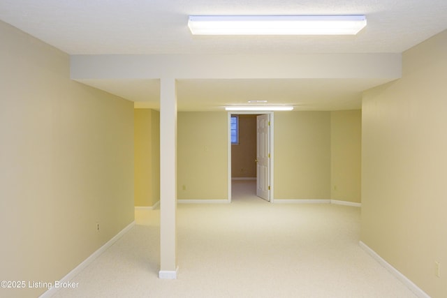 basement with a textured ceiling