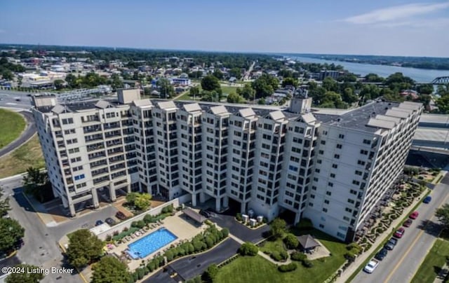 birds eye view of property with a water view