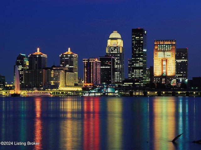 property's view of city featuring a water view