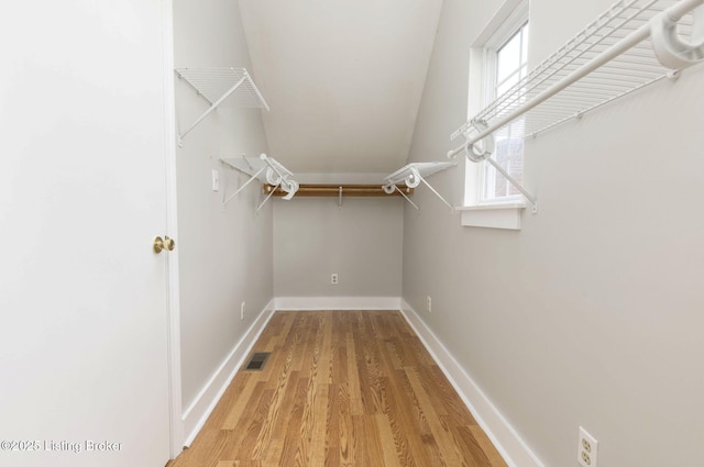 walk in closet featuring light wood-type flooring