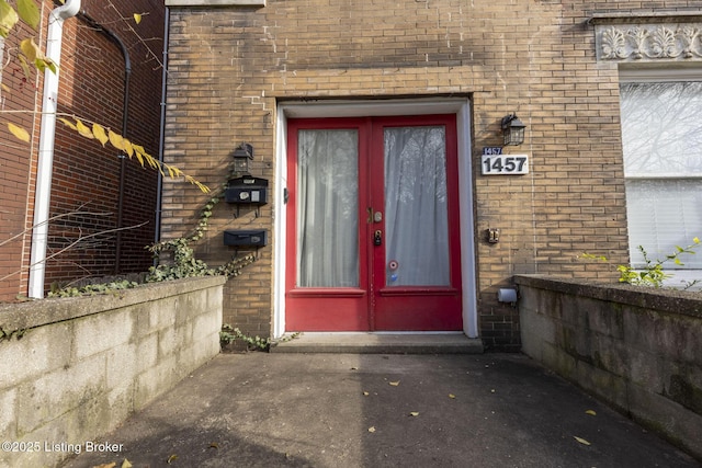 entrance to property featuring french doors