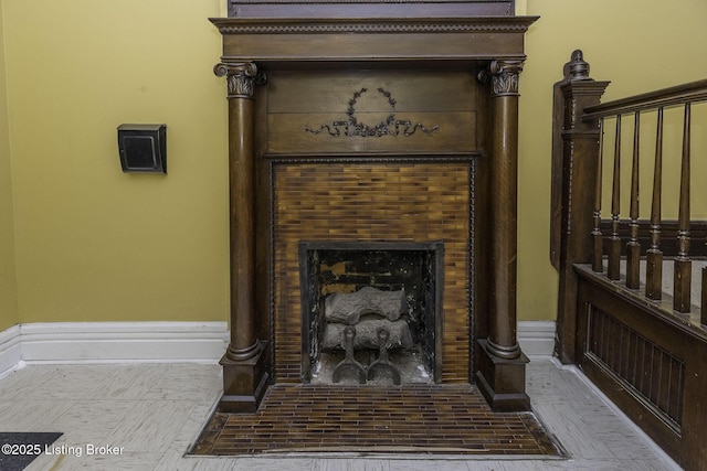 interior details featuring a fireplace