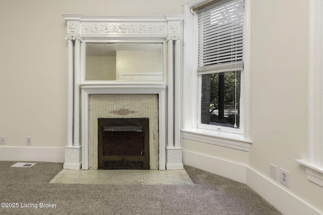 details with carpet and a fireplace