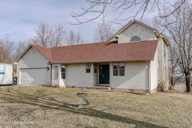 view of front of home featuring a garage and a front yard