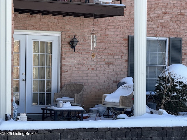 view of snow covered patio