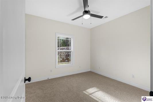 unfurnished room featuring ceiling fan and carpet